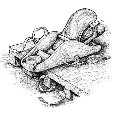 Block Plane on dovetailed board with shavings