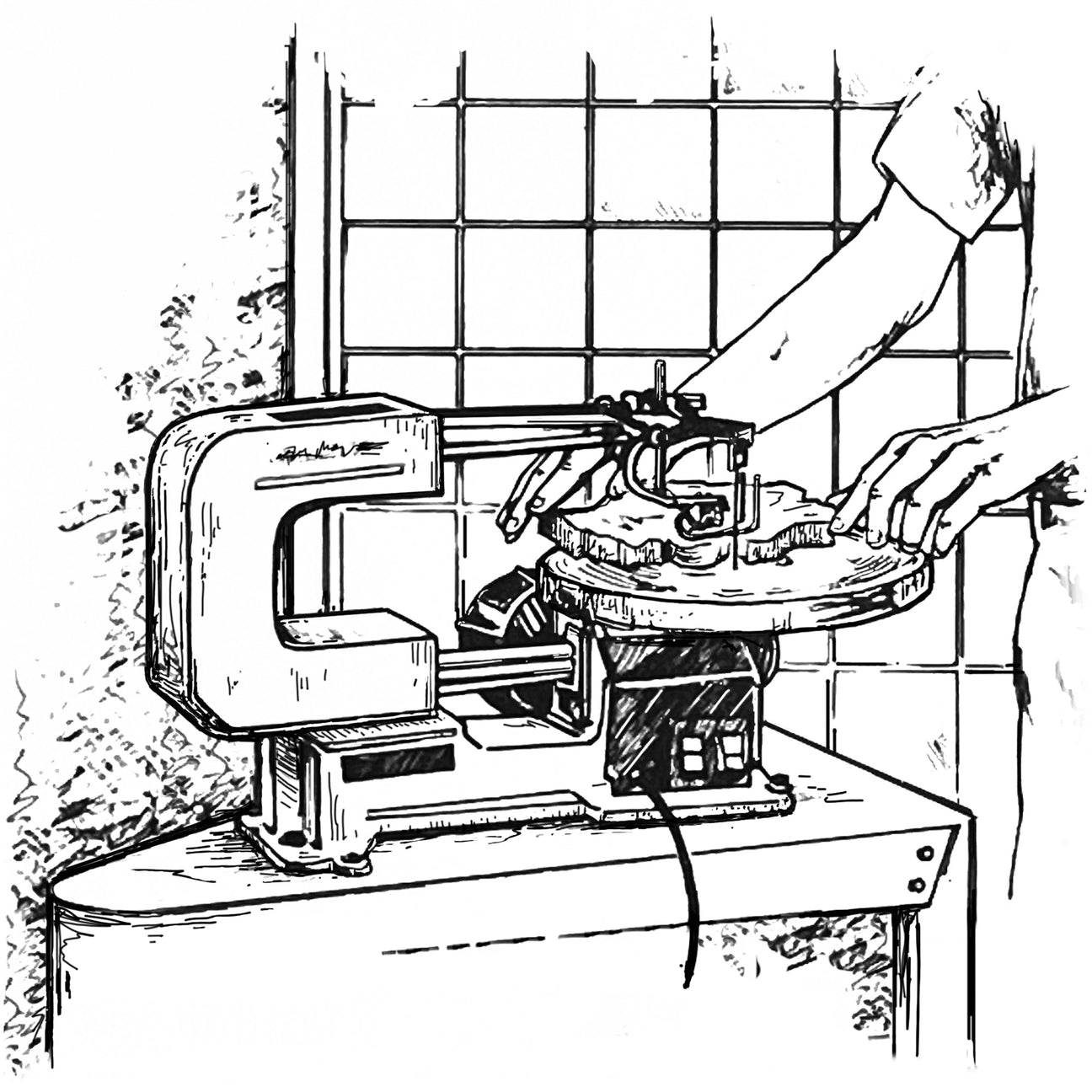 A scrollsaw in use.